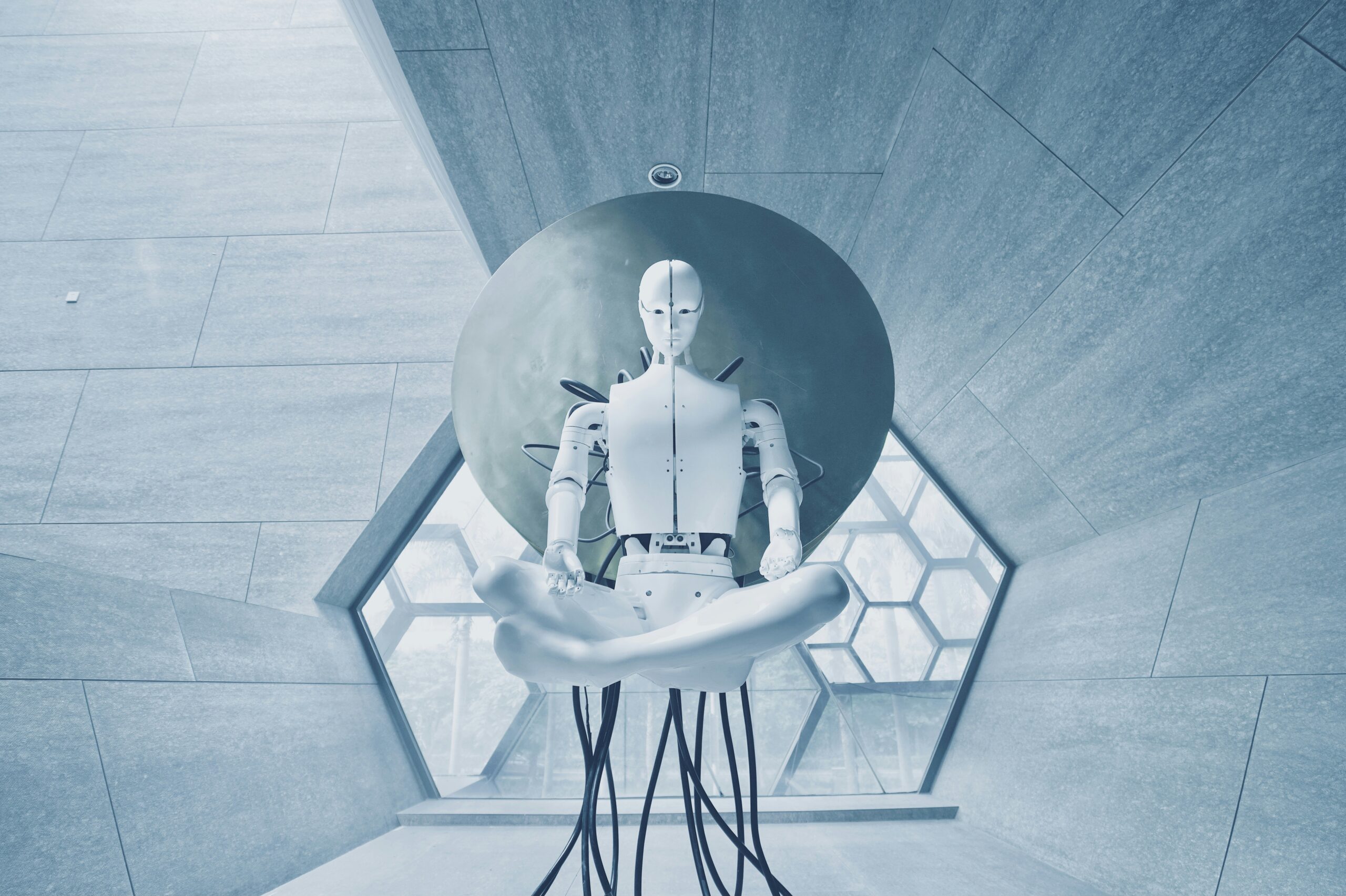 robot sitting in futuristic room
